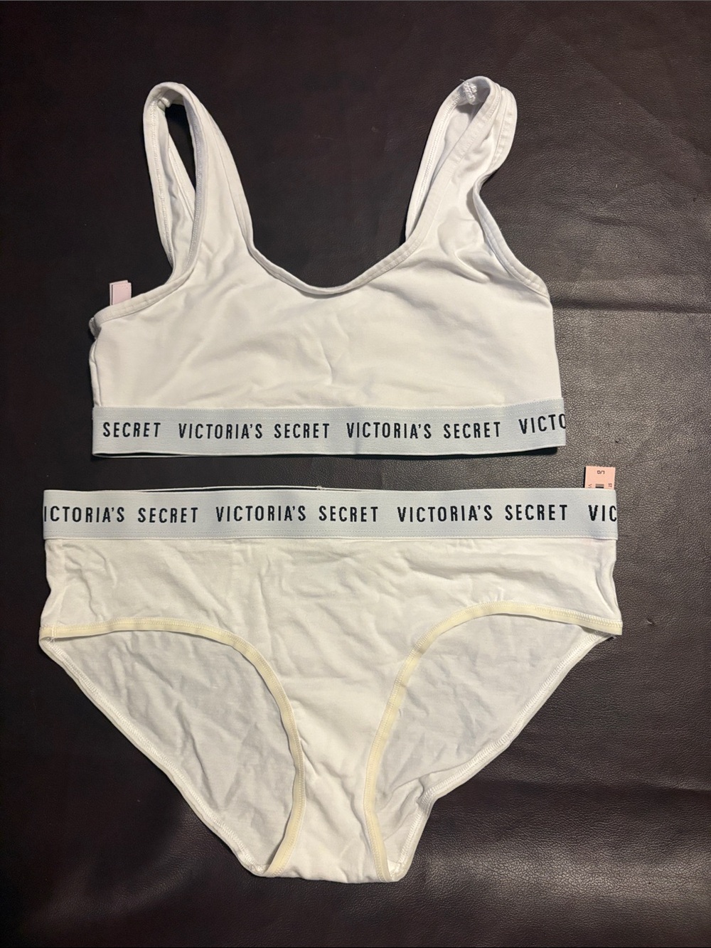 Victoria’s white bralette and hiphugger panty medium & large logo band M/L